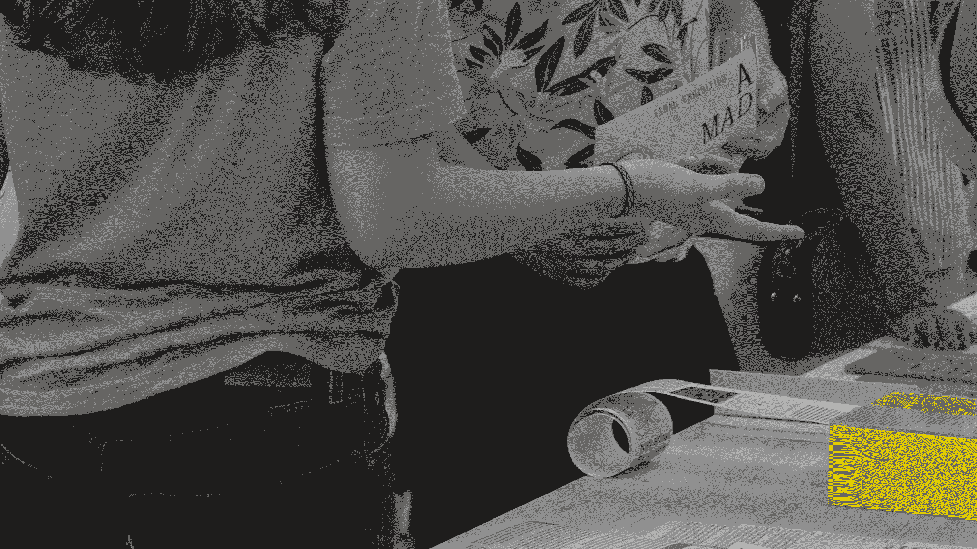 paradox of distractions exbibition flag holded on a wood stand