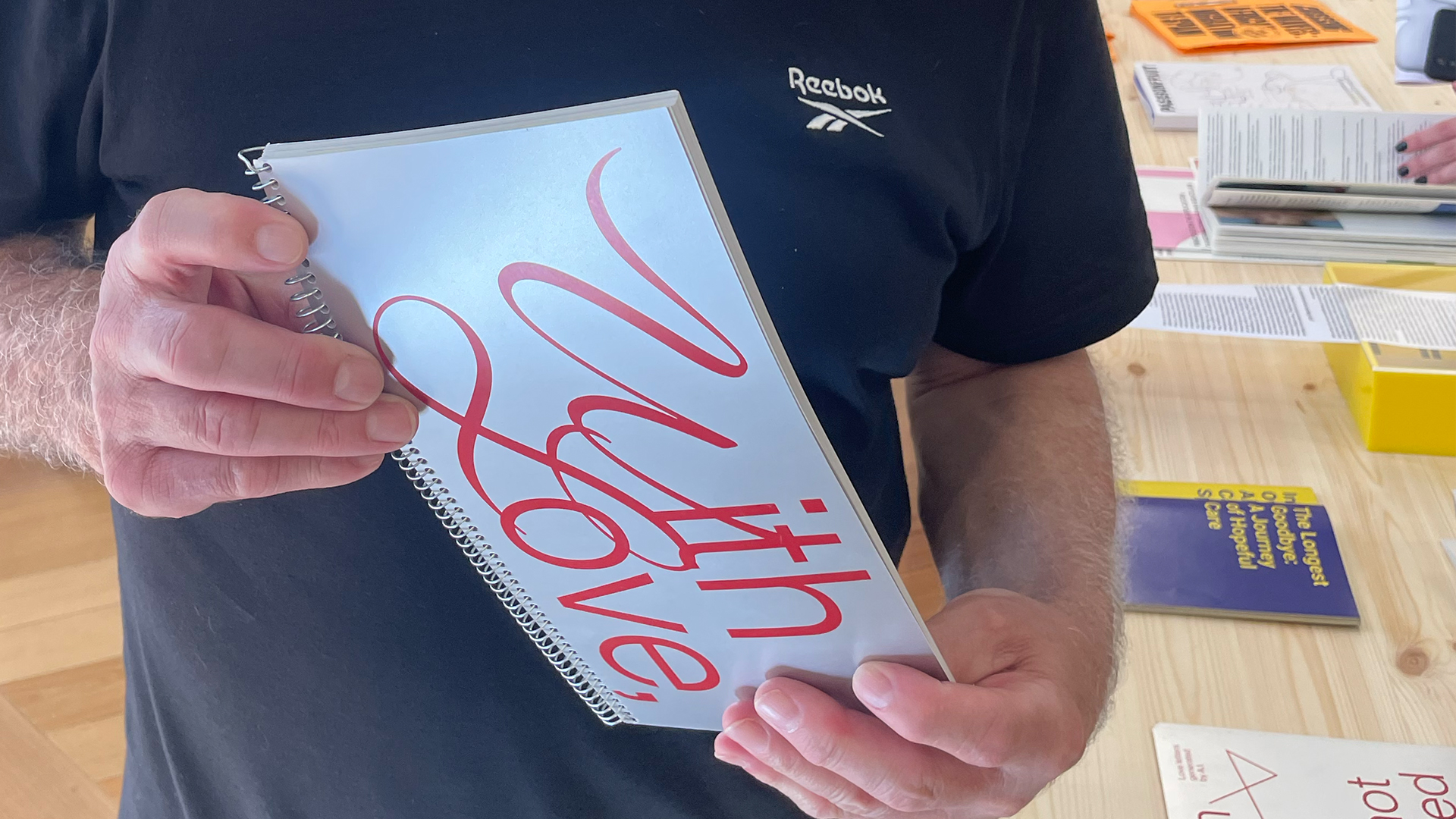 with love exbibition photo person holding the book