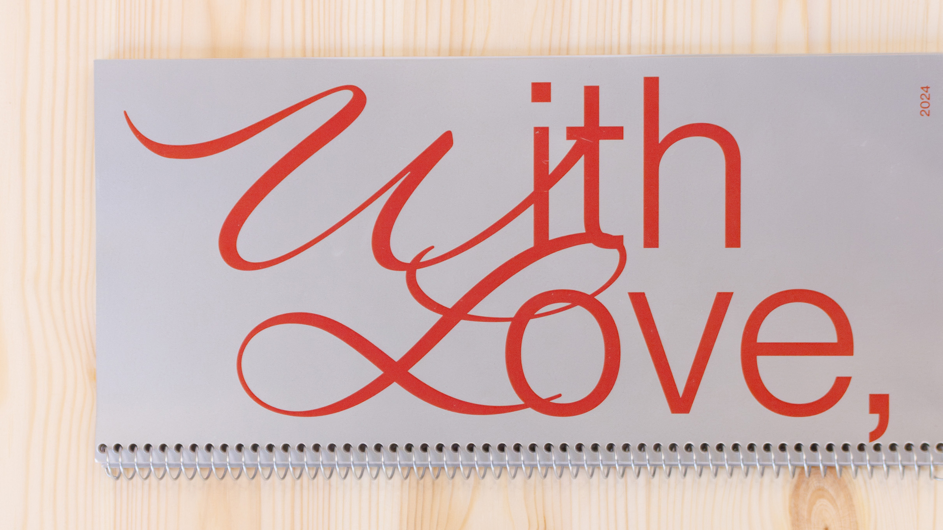 with love exbibition photo the book on wood table